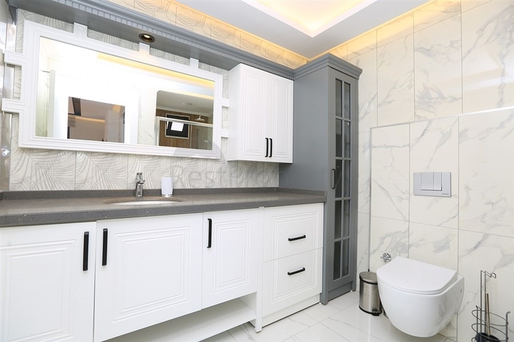 Квартира планировкой 3+1 с отдельной кухней в центральной части Алании