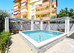 Квартира планировкой 3+1 с отдельной кухней в центральной части Алании