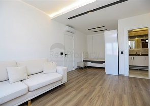 Квартира планировкой 3+1 с отдельной кухней в центральной части Алании