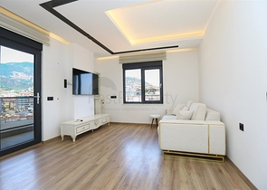 Квартира планировкой 3+1 с отдельной кухней в центральной части Алании