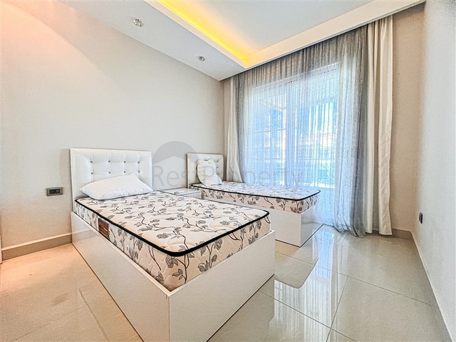 Квартира 2+1 в районе Махмутлар на первой линии