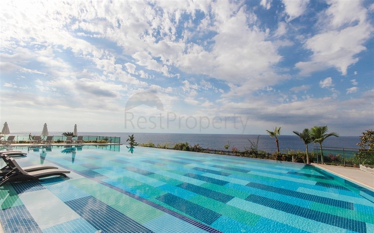 Меблированная квартира 2+1 с видом на море в районе Каргыджак