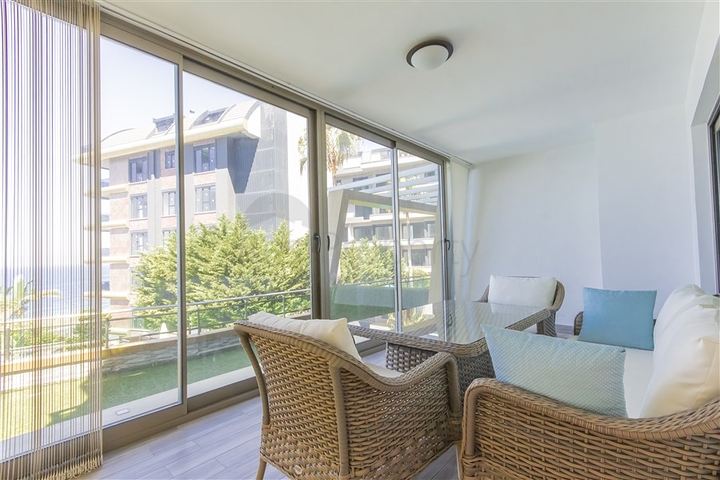 Меблированная квартира 2+1 с видом на море в районе Каргыджак