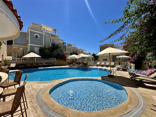 Трехкомнатная квартира в районе Джикджилли 