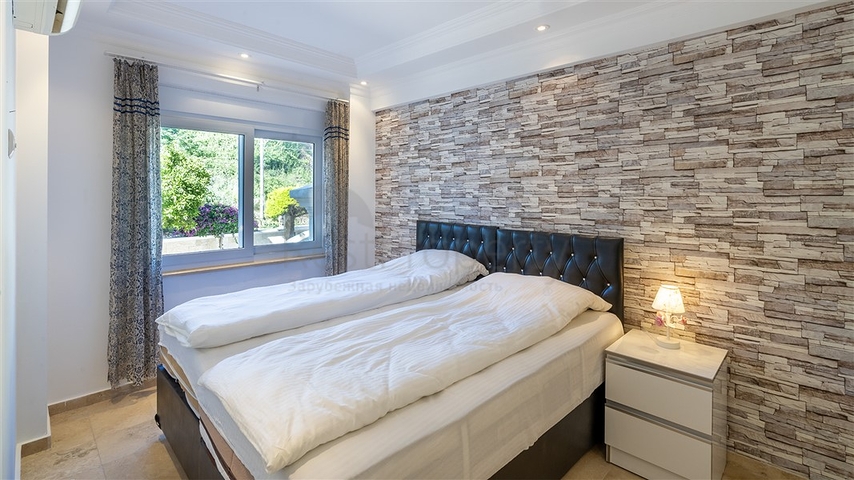 Трехкомнатная квартира в районе Джикджилли 