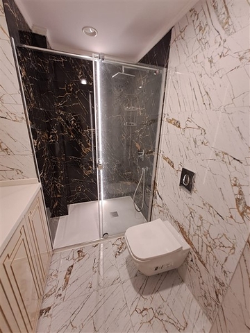 Квартира 1+1 на первой береговой линии в Махмутларе