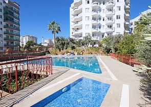 Двухкомнатная квартира с мебелью в районе Тосмур