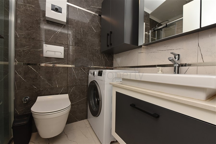 Стильная двухкомнатная квартира в уютном районе Авсаллар