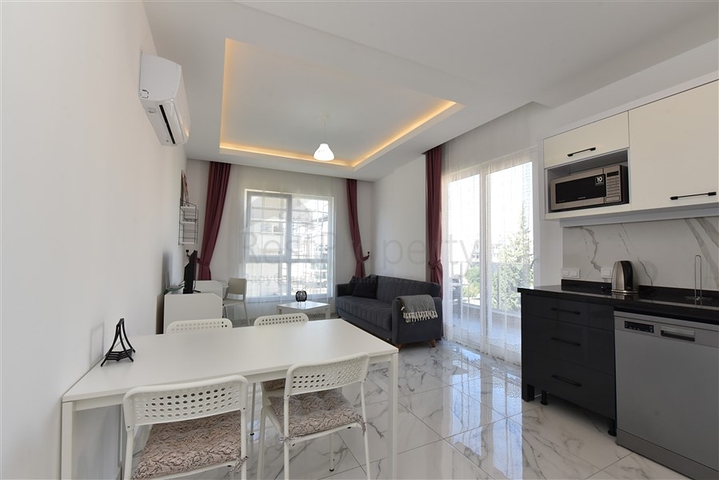 Стильная двухкомнатная квартира в уютном районе Авсаллар