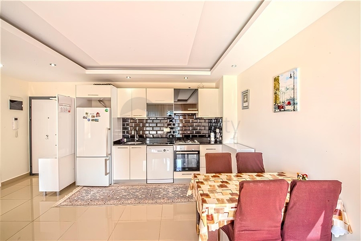 Квартира 1+1 в популярном жилом комплексе в районе Авсаллар