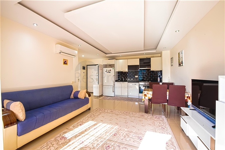 Квартира 1+1 в популярном жилом комплексе в районе Авсаллар