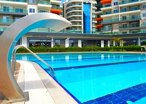 Квартира 1+1 в популярном жилом комплексе в районе Авсаллар