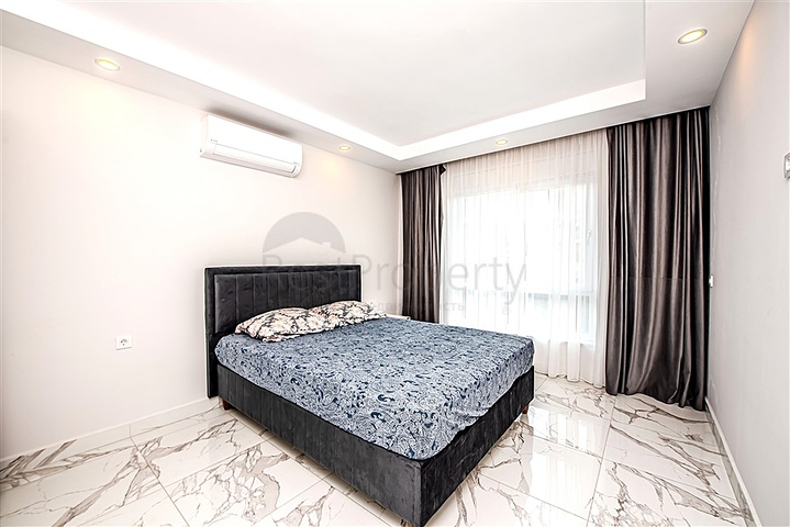 Апартаменты 1+1 в районе Махмутлар