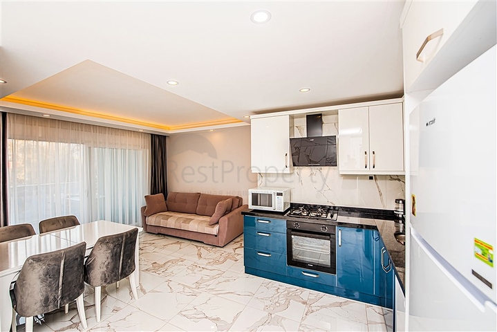 Апартаменты 1+1 в районе Махмутлар