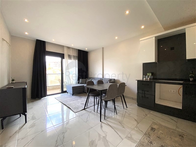 Двухкомнатная квартира в районе Алании - Оба