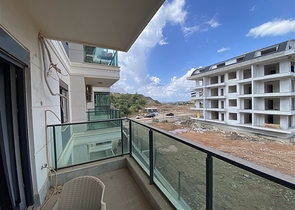 Двухкомнатная квартира в районе Алании - Оба