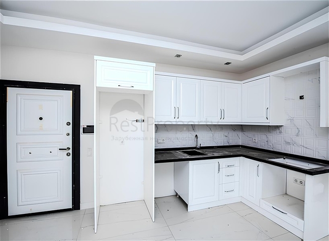 Новый квартира 1+1 в районе Махмутлар