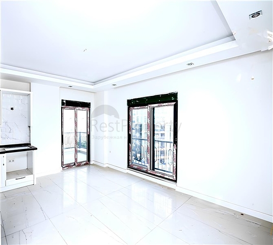 Новый квартира 1+1 в районе Махмутлар