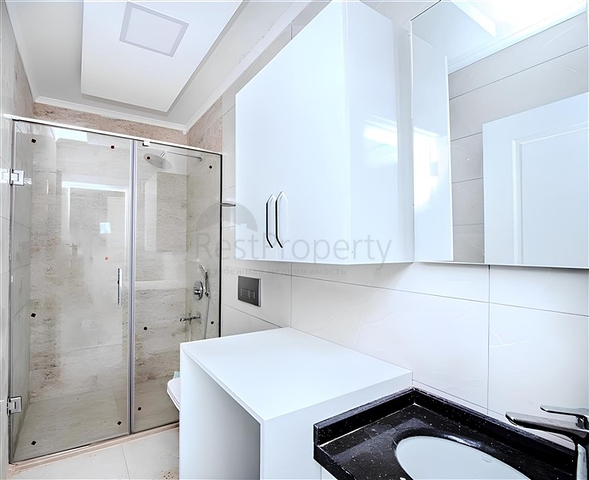 Новый квартира 1+1 в районе Махмутлар