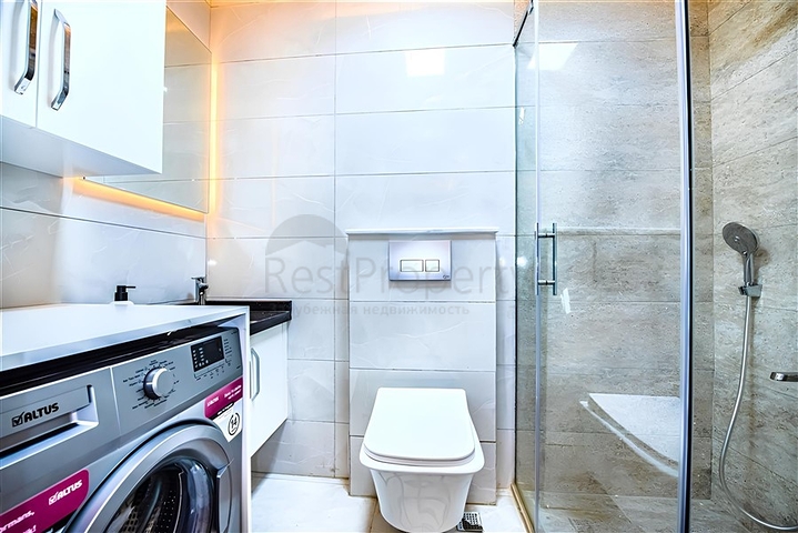 Новый квартира 1+1 в районе Махмутлар