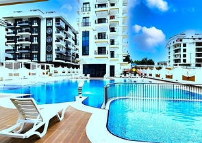 Новый квартира 1+1 в районе Махмутлар