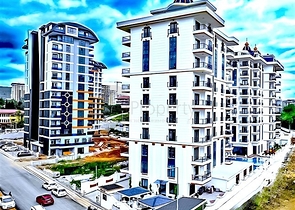 Новый квартира 1+1 в районе Махмутлар