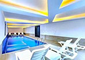 Новый квартира 1+1 в районе Махмутлар