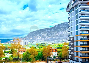 Новый квартира 1+1 в районе Махмутлар