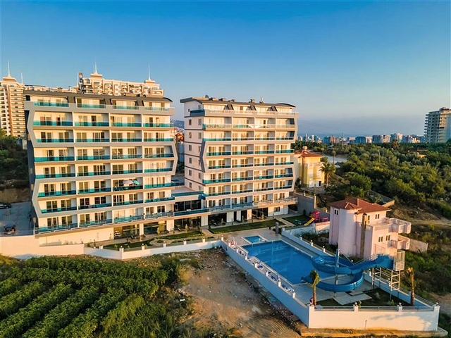 Квартира 1+1 в современном комплексе в районе Махмутлар