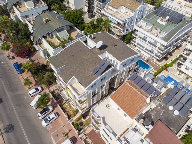 Квартиры 1+1 и 2+1 на продажу с видом на море в Гюрсу Анталья