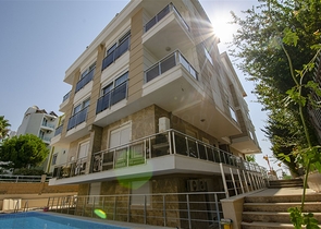 Квартиры 1+1 и 2+1 на продажу с видом на море в Гюрсу Анталья