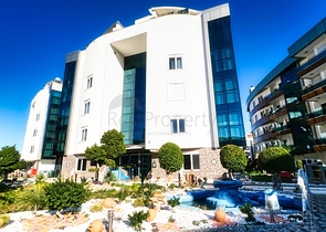 Квартира 2+1 в комплексе отельного плана в 5 минутах от моря