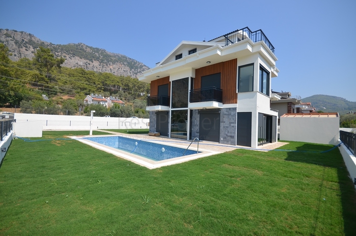 Вилла планеровки 4+1 в районе Фетхие 