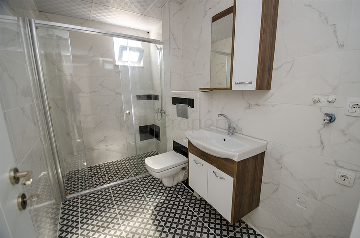 Квартиры 1+1  в готовом проекте в Муратпаше Анталья