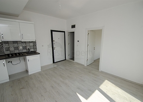 Квартиры 1+1  в готовом проекте в Муратпаше Анталья