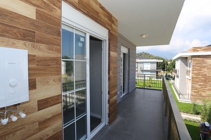 Квартиры 2+1 в новом комплексе в Чамьюва Кемере 800 м до моря