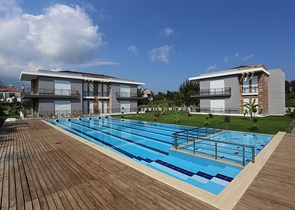 Квартиры 2+1 в новом комплексе в Чамьюва Кемере 800 м до моря