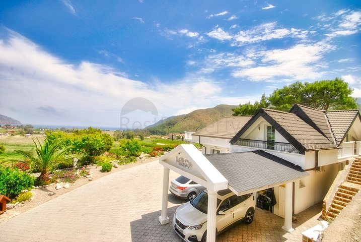 Великолепная отдельностоящая вилла на продажу с ВИДОМ НА МОРЕ в Анталии Кемер