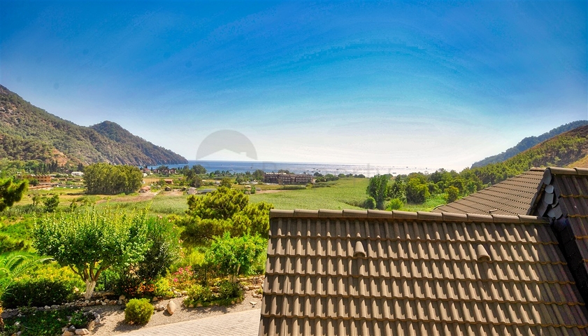 Великолепная отдельностоящая вилла на продажу с ВИДОМ НА МОРЕ в Анталии Кемер