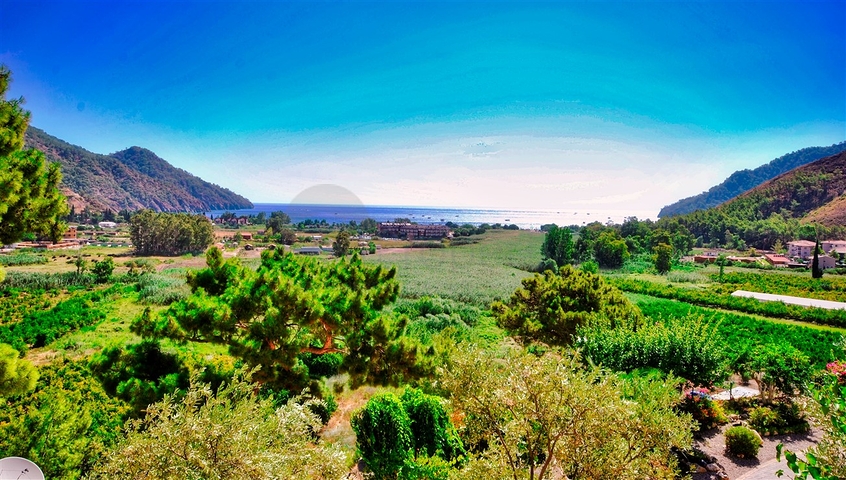 Великолепная отдельностоящая вилла на продажу с ВИДОМ НА МОРЕ в Анталии Кемер