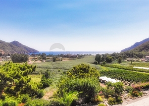 Великолепная отдельностоящая вилла на продажу с ВИДОМ НА МОРЕ в Анталии Кемер