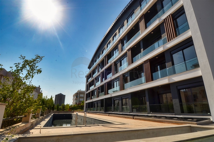 Новые квартиры планировки 1+1 и 2+1 от застройщика в районе Лара