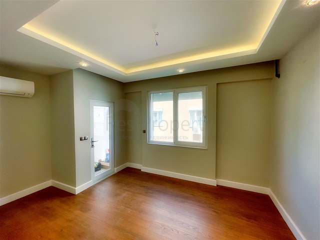 Просторная квартира 3+1 в пешей доступности к морю в районе Лиман-Анталья