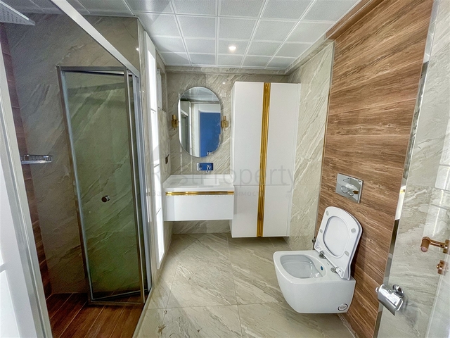 Просторная квартира 3+1 в пешей доступности к морю в районе Лиман-Анталья