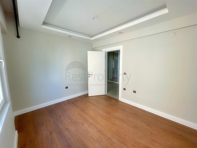 Просторная квартира 3+1 в пешей доступности к морю в районе Лиман-Анталья