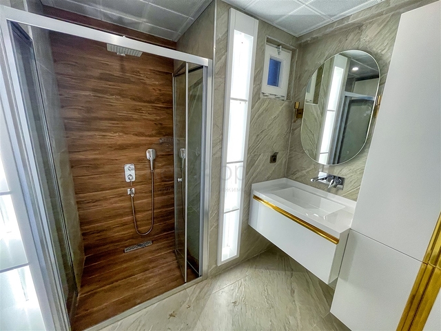 Просторная квартира 3+1 в пешей доступности к морю в районе Лиман-Анталья