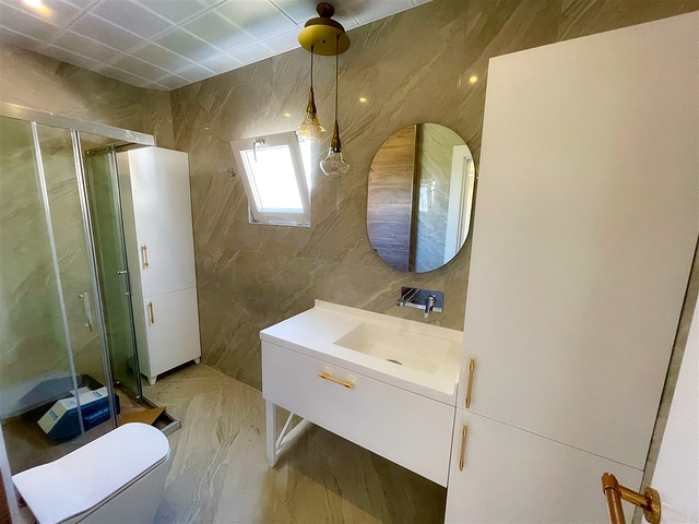 Просторная квартира 3+1 в пешей доступности к морю в районе Лиман-Анталья