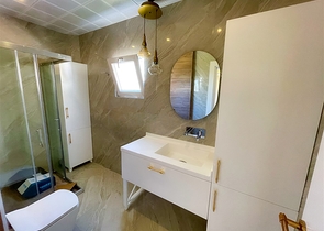 Просторная квартира 3+1 в пешей доступности к морю в районе Лиман-Анталья