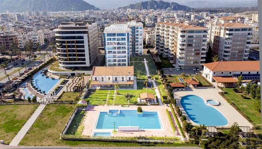 Квартира у моря планировки 3+1 в районе Лиман - Анталия