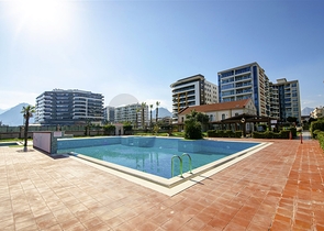 Квартира у моря планировки 3+1 в районе Лиман - Анталия